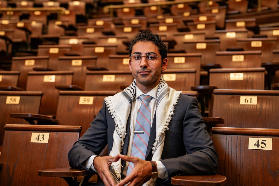 Mohsen Mahdawi poses for a portrait inside Havemeyer Hall on the Columbia University campus in New York City.