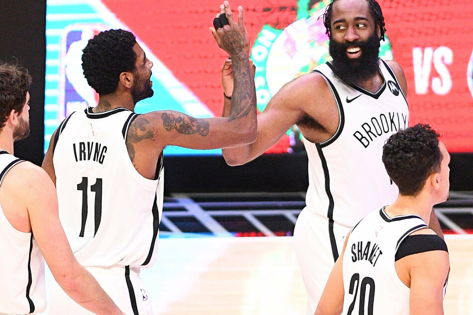 The Nets' Kyrie Irving (r.) played for the first time in seven months on Wednesday.