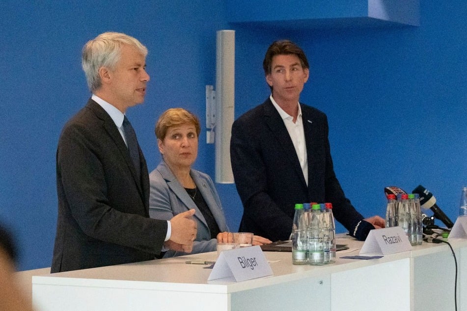 Bundesverkehrsminister Steffen Bilger (47, CDU, v.l.), Nicole Razavi (61, CDU), Baden-Württembergs Verkehrsministerin, und Ulrich Heppe (55), Geschäftsführer des Flughafens Stuttgart, stellten das neue System in Stuttgart vor.