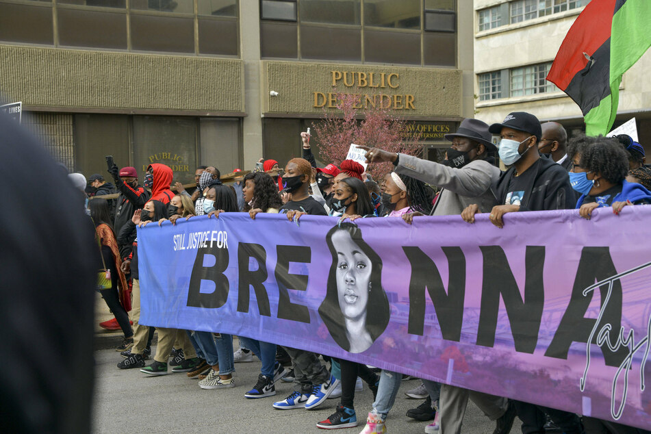 Protesters and activists marching in honor of Breonna Taylor downtown in Louisville, on the anniversary of her death.