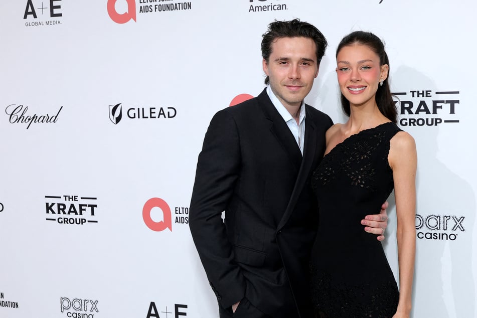 Brooklyn Beckham (l) has reportedly got a new tattoo tribute to his wife Nicola Peltz (r.)