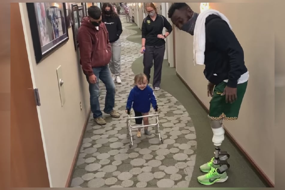 The video shows Blake Leeper (31) cheering Dyer on as he went on a first walk with his prosthetic leg.