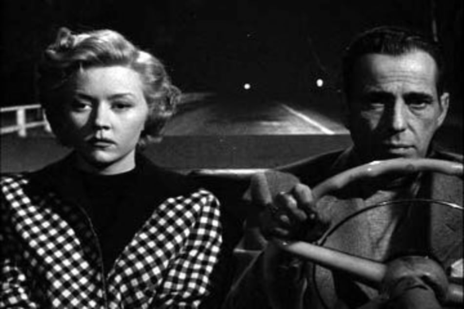Gloria Grahame and Humphrey Bogart star as Laurel Gray and Dixon Steele in Nicholas Ray's In a Lonely Place.