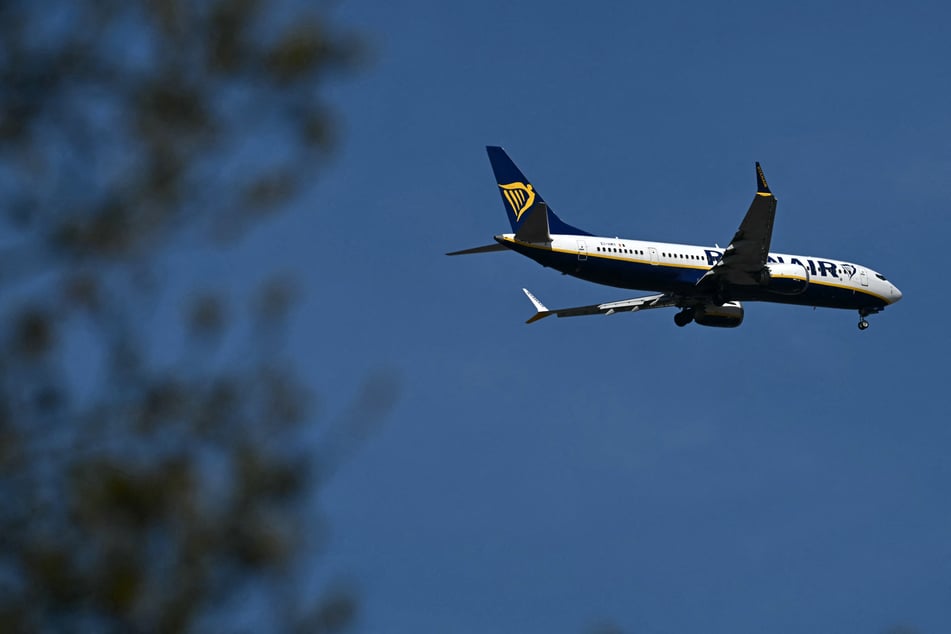 Man nearly sucked out of "detached" airplane window during dramatic flight from Greece to Germany