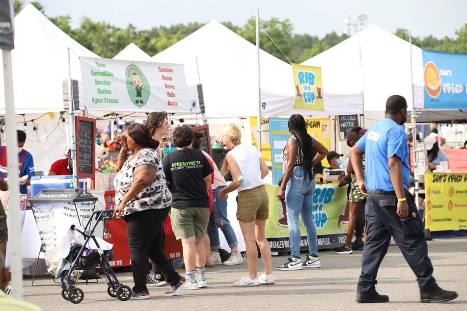 On Monday, an audience enjoyed a hip hop concert and food stalls in Orchard Beach, The Bronx during NYC Homecoming Week.