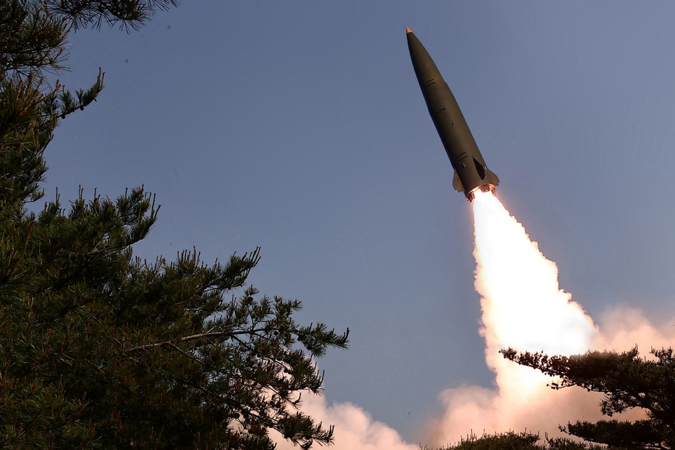 A missile is launched, as North Korea conducted a test firing of a tactical ballistic missile on Friday, state media KCNA said on Saturday, at an unknown location in North Korea, in a handout picture obtained by Reuters on May 18.