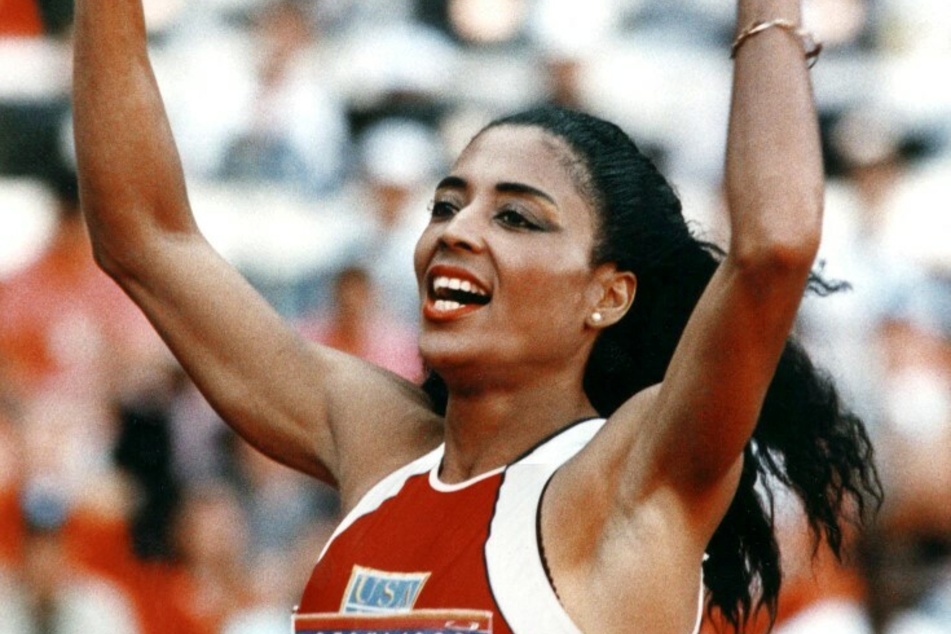 Florence Griffith-Joyner celebrates after gold-medal run at the 1988 Seul Olympics.