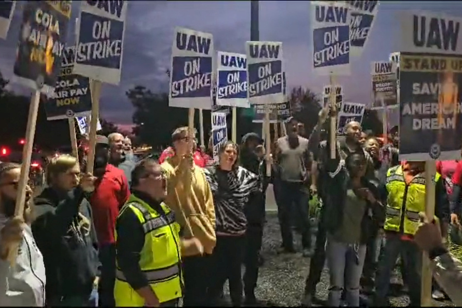 United Auto Workers members strike outside of Ford's Kentucky Truck Plant in Louisville on October 11, 2023.
