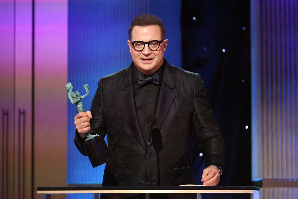 Brendan Fraser accepts the Outstanding Performance by a Male Actor in a Leading Role for The Whale during the 29th Screen Actors Guild Awards.