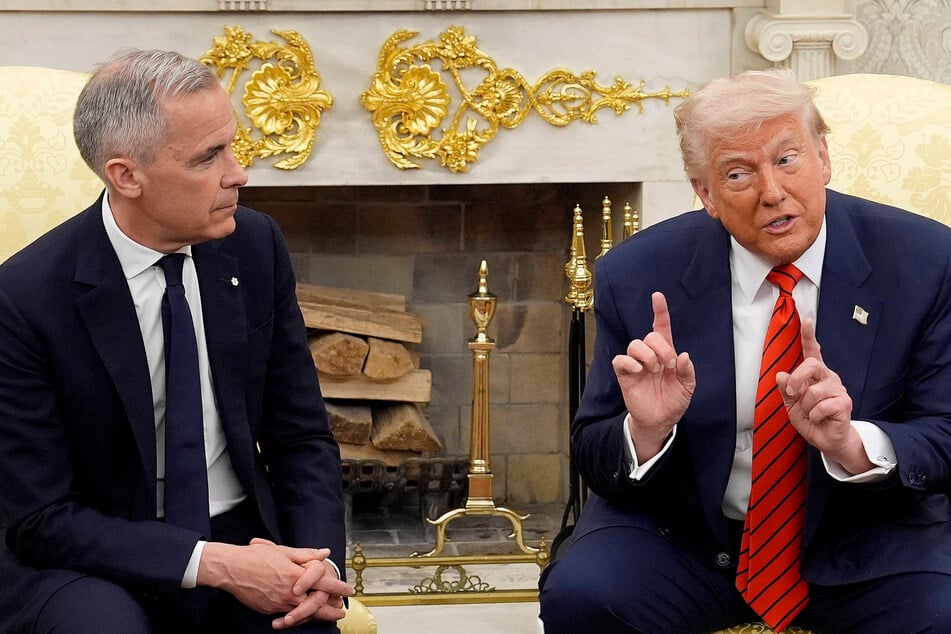 Mark Carney (l.) has pushed for Canada to be less dependent on the US economically.