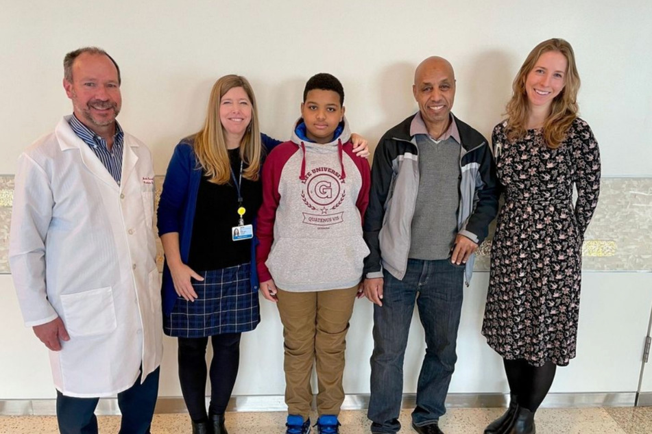 A new gene therapy has allowed several children born deaf to hear for the first time, including 11-year-old Aissam Dam (c) at Children's Hospital of Philadelphia.