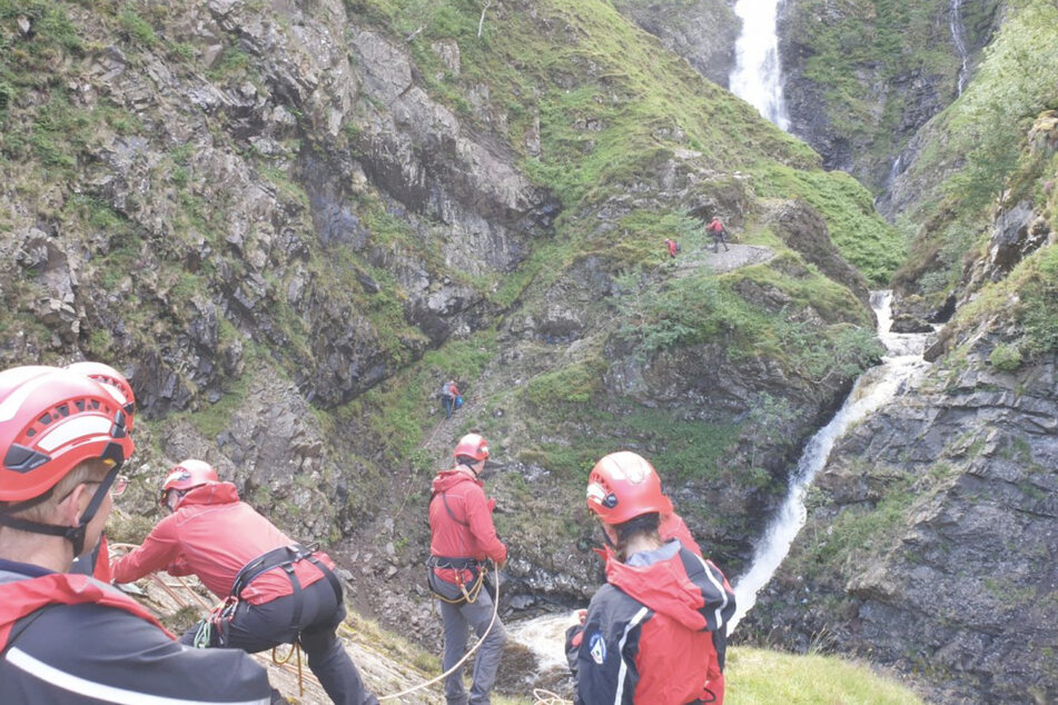 Mountain Moffat Rescue team had to work hard to rescue the small dog, who had fallen a huge distance.