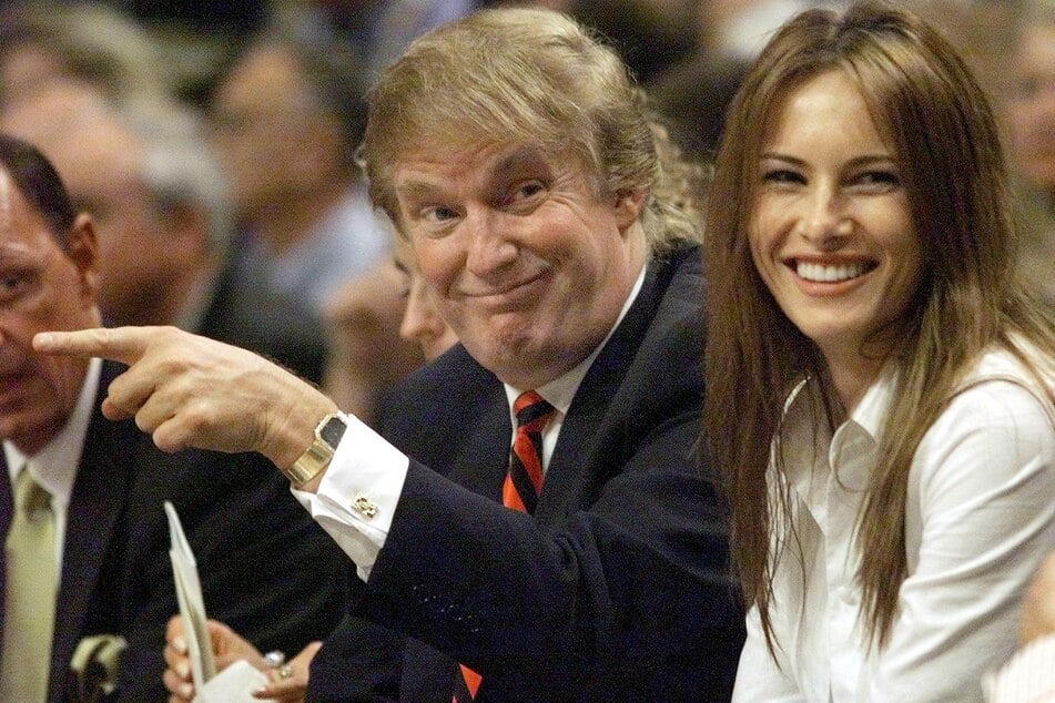 Donald Trump (l.) with Melania Trump (r.) during a basketball game at Market Square Arena in Indianapolis, Indiana on June 1, 1999.