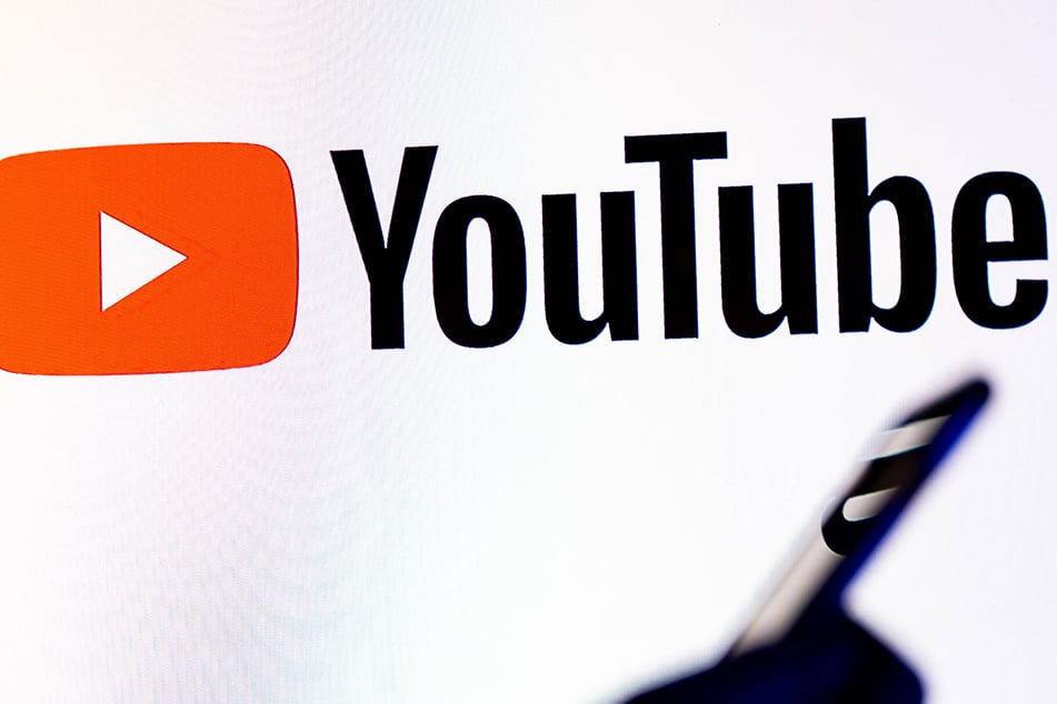 YouTube has banned the channel of a pro-Iran group that shared viral cartoonish videos mocking Trump.