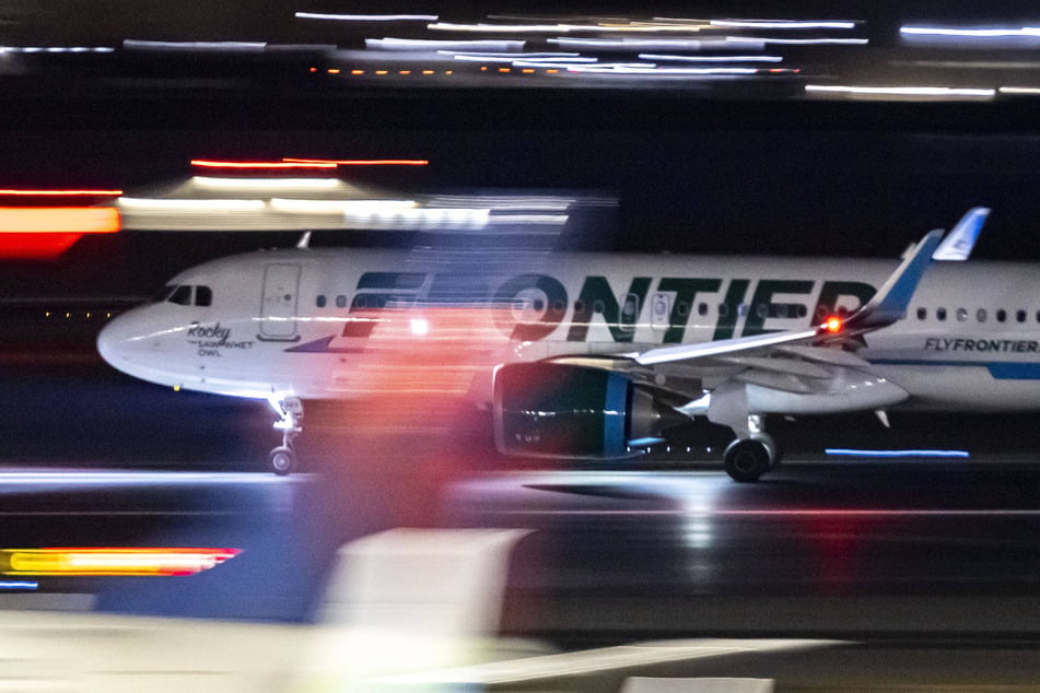 A Frontier Airlines plane aborted its takeoff after striking a person on the runway at the Denver International Airport late Friday.