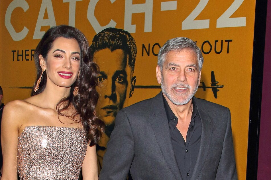 Amal Clooney with her husband George at the London premiere of the series Catch-22.