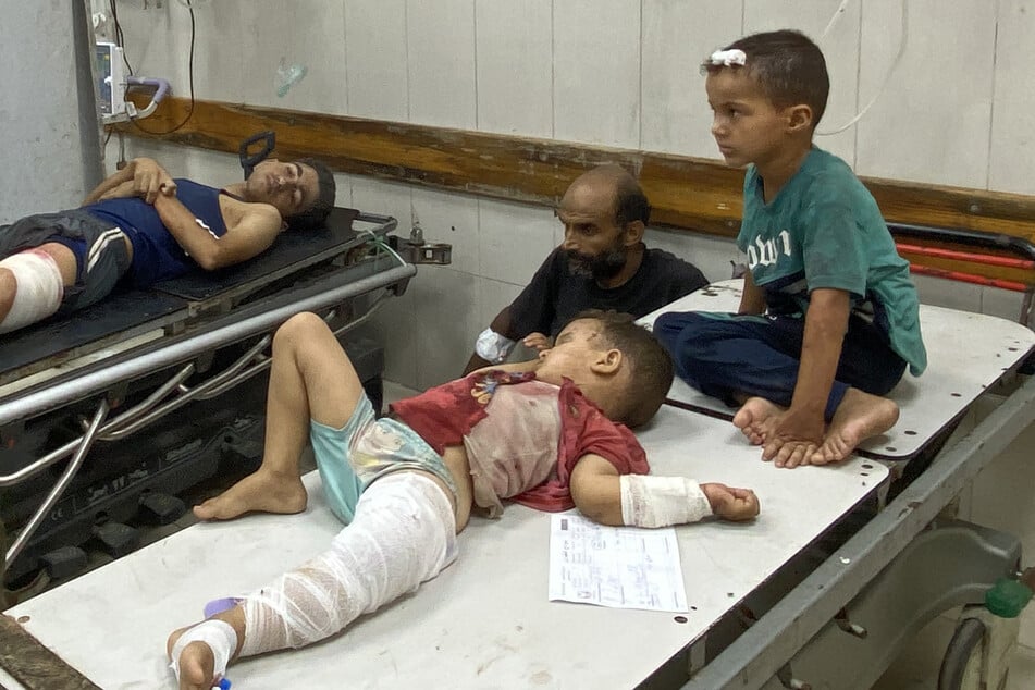 Injured children wait for treatment at Nasser Medical Complex in Khan Younis in the southern Gaza Strip.
