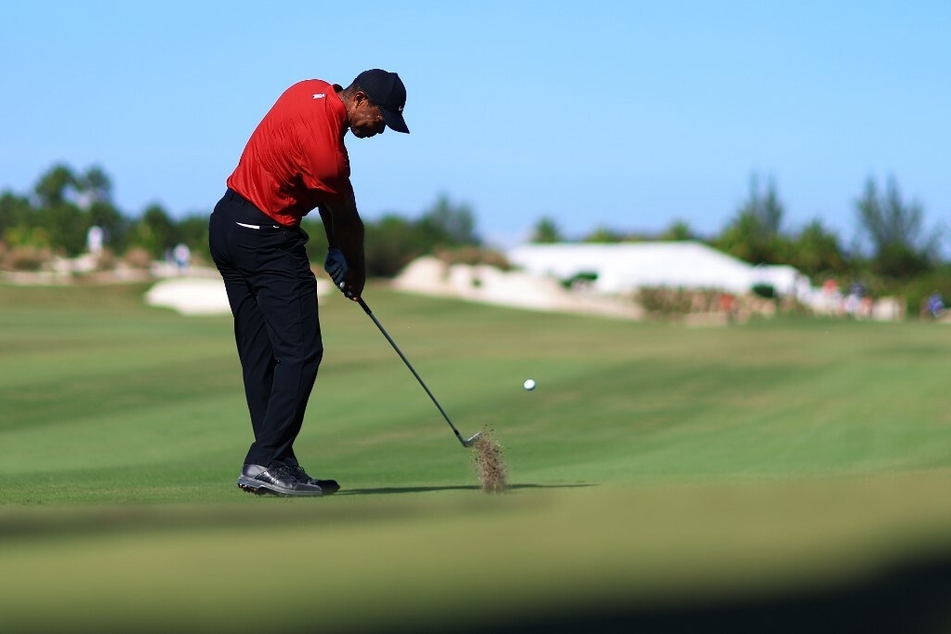 Tiger Woods of the United States plays a shot on the third hole during the final round of the Hero World Challenge at Albany Golf Course on December 3, 2023.