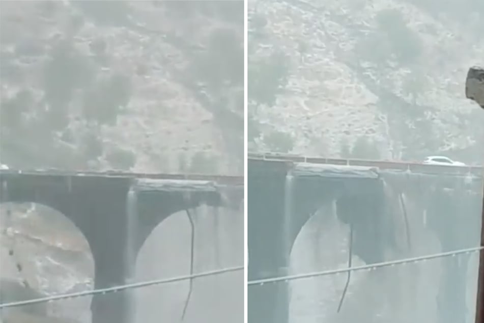 Mientras los coches pasan por encima: Puente se desmorona bajo una lluvia torrencial