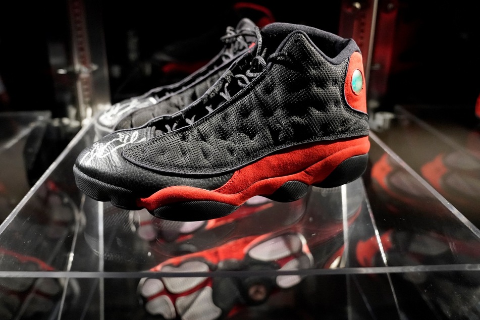 A signed pair of the Air Jordan 13 sneakers Michael Jordan wore during the 1998 NBA Finals, known as The Last Dance, sold for a record $2.2 million.