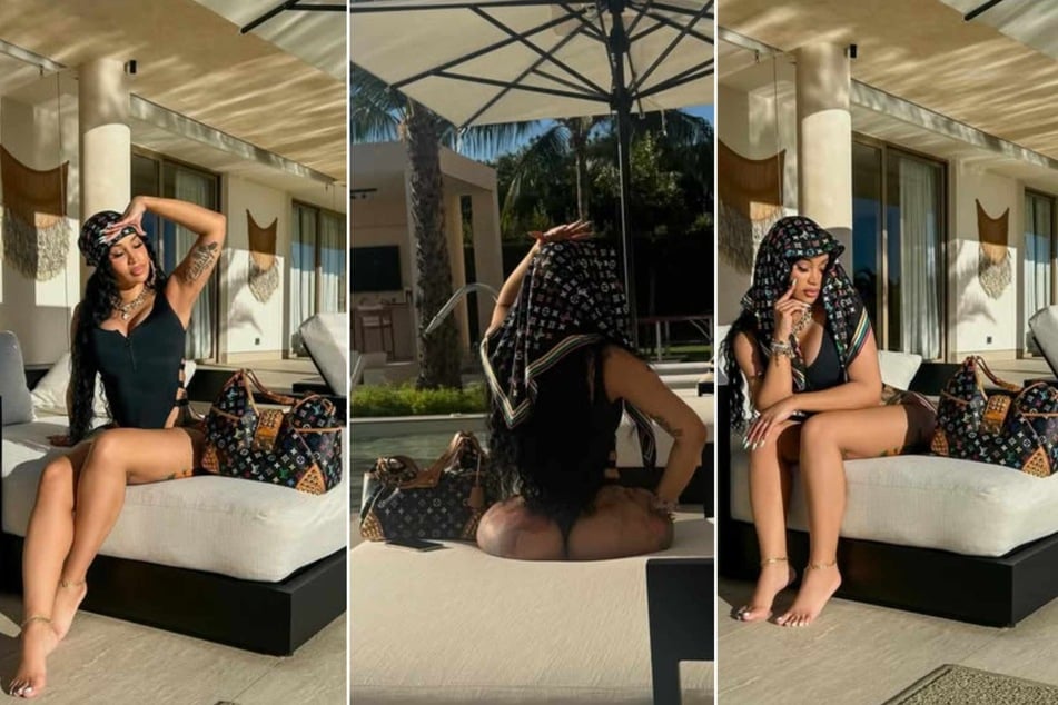 Cardi B's photo set also included a few snaps of another Louis Vuitton-patterned fashion moment, this time in monochrome black.