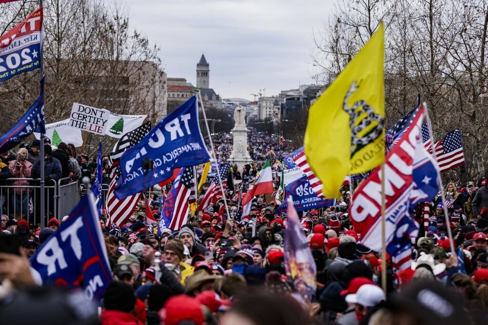 Pro-Trump supporters gather outside the US Capitol following a rally with then President Donald Trump on January 6, 2021, in Washington DC.
