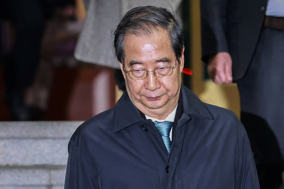 Han became the first acting president in South Korea's history to be impeached, amid accusations that he was shielding his predecessor from prosecution.