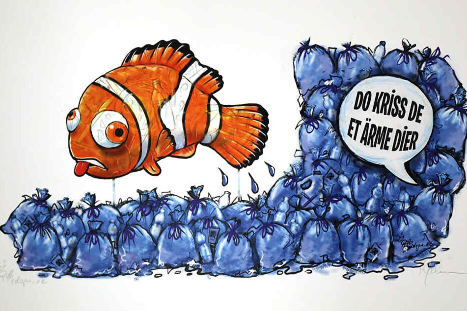 Die Reproduktion einer Zeichnung des Kölner Karikaturisten Rollo zeigt den an den Zeichentrick-Film "Findet Nemo" angelehnten Entwurf für einen Motivwagen zum Thema Plastikmüll im Meer.