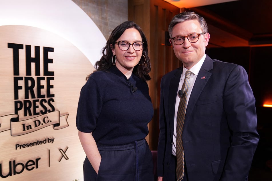 Bari Weiss (L) hosts Speaker of the House Mike Johnson (R) during an event for The Free Press in Washington DC on January 17, 2025.