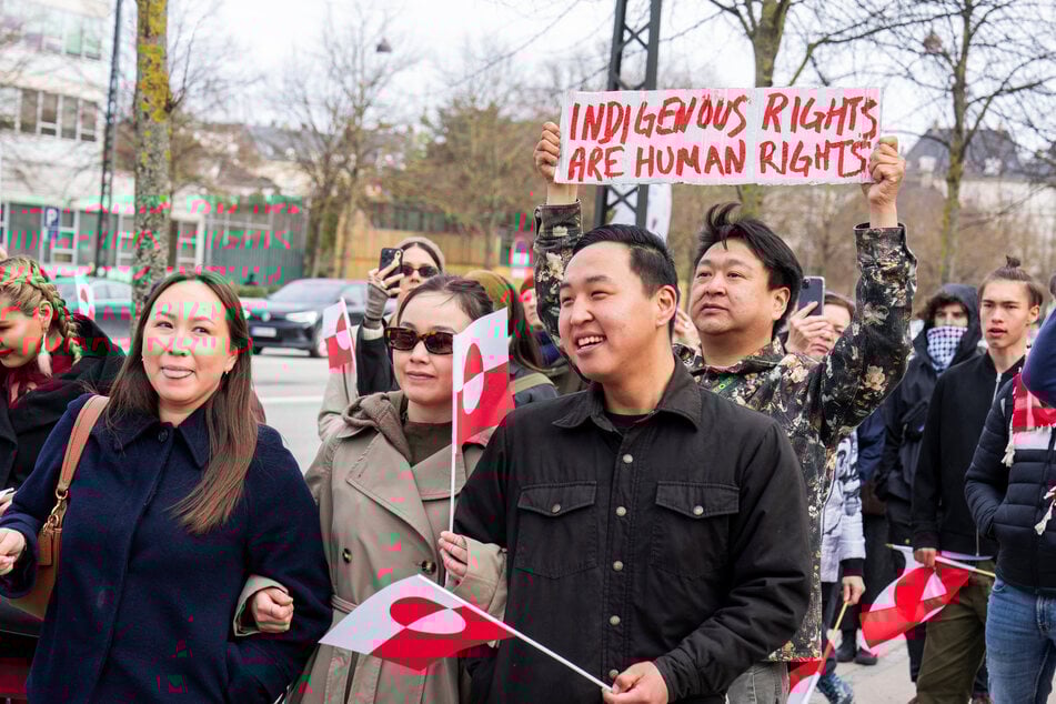 People take part in a Greenlandic "Hands off Kalaallit Nunaat" demonstration at the American embassy in Copenhagen, Denmark, on April 6, 2025.