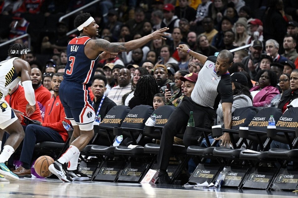Bradley Beal (l) of the Washington Wizards pushed the game referee John Butler during the Saturday game against the Indiana Pacers at Capital One Arena in Washington DC.