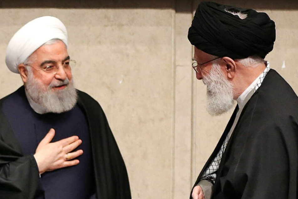Hassan Rouhani, Präsident des Iran (l.) und Ajatollah Ali Chamenei (r.), Religionsführer des Iran.