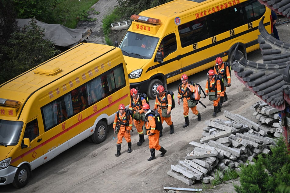 Rescue workers arrive to carry out rescue operations following a gas explosion at the Liushenyu coal mine in Changzhi, in northern China's Shanxi province on Saturday.