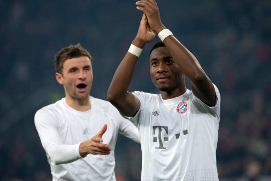 Thomas Müller (l) und David Alaba feiern nach dem Kanter-Sieg gegen die Fortuna.
