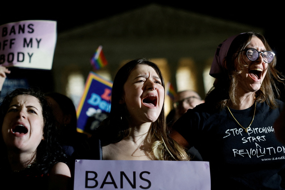 Protesters rally outside the Supreme Court after the leak of a draft majority opinion preparing for a majority to overturn the landmark Roe v. Wade abortion rights decision.