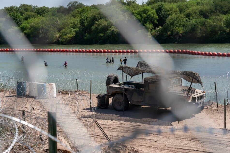 Texas ordered to remove anti-migrant river buoys as judge criticizes Governor Abbott