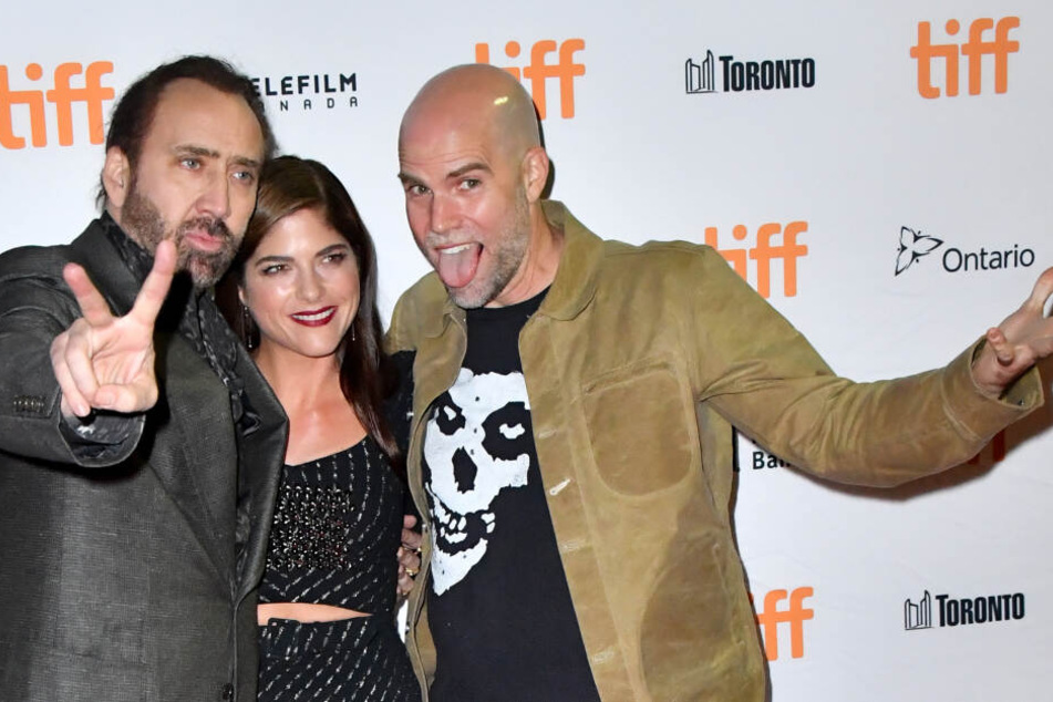 Die Schauspieler Nicolas Cage und Selma Blair mit Regisseur Bryan Taylor in Toronto (Kanada) zur Premiere des Films "Mom and Dad".