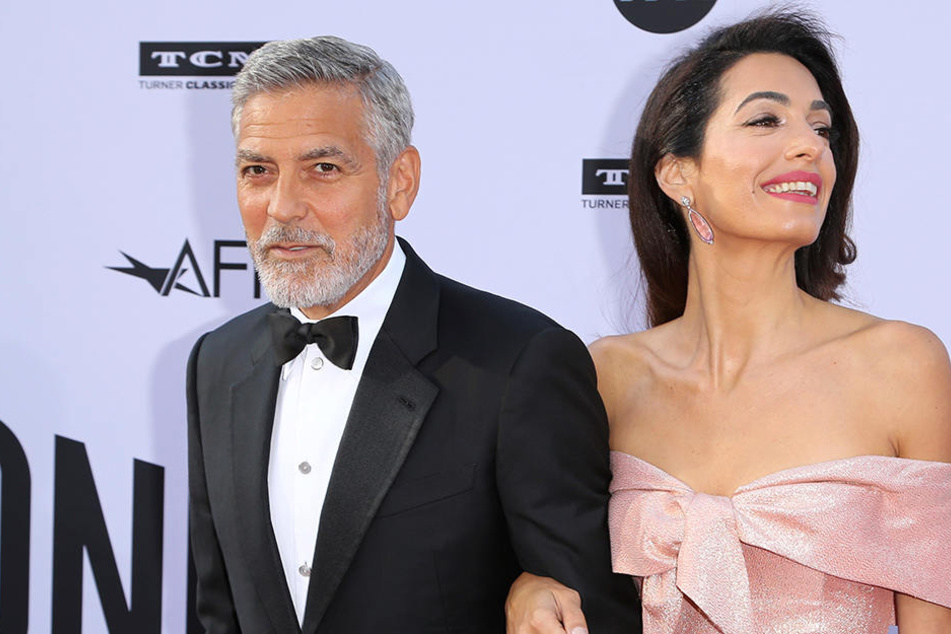 George und Amal Clooney wollen ihrer Zwillinge in guten Händen wissen.