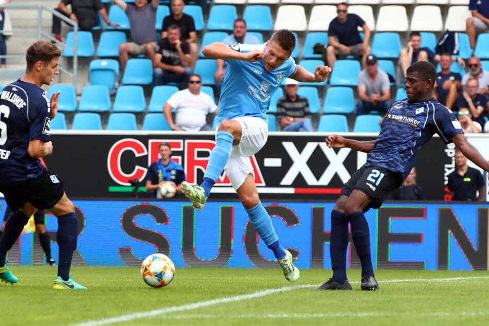 Marco Schuster (l), Daniel Frahn und Benedict dos Santos (r.).