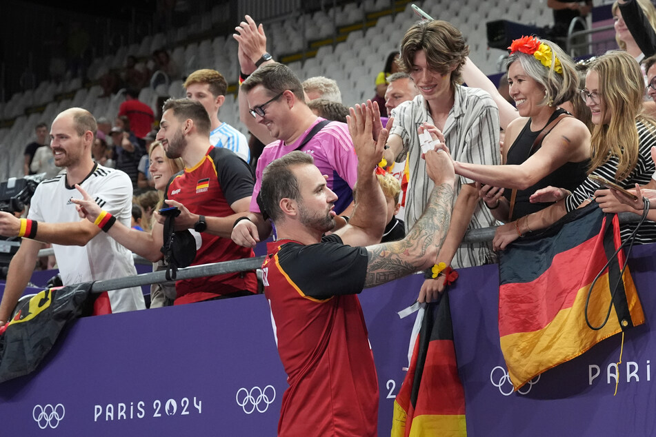 Die deutschen Volleyball-Fans dürfen sich weiterhin auf Georg Grozer (vorn) freuen.