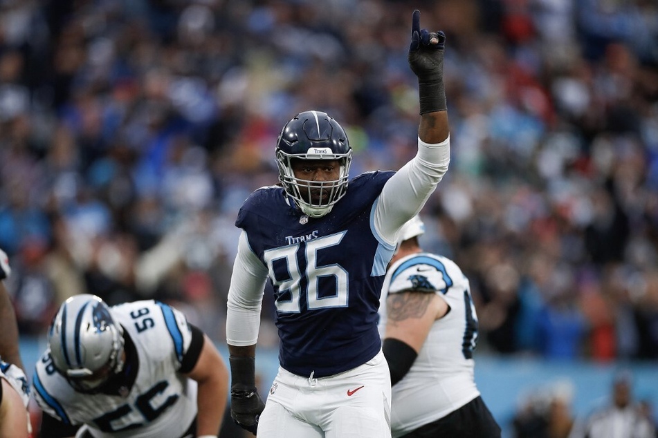 Denico Autry of the Tennessee Titans celebrates a sack during the fourth quarter against the Carolina Panthers at Nissan Stadium on November 26, 2023, in Nashville.