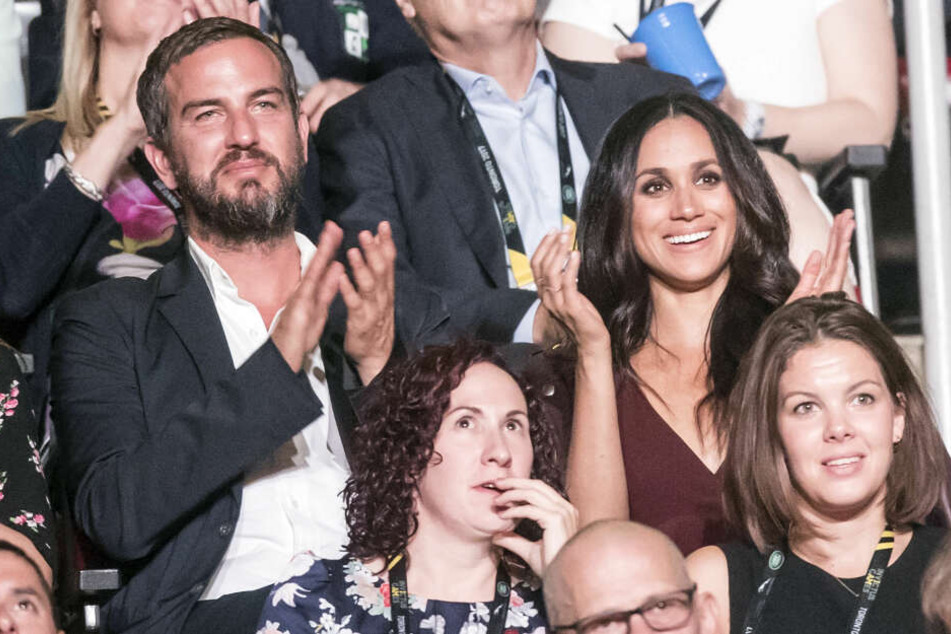 Meghan 2017 bei den Invictus-Games mit Markus Anderson, der für ein ungestörtes Date der Schauspielerin mit Prinz Harry sorgte.