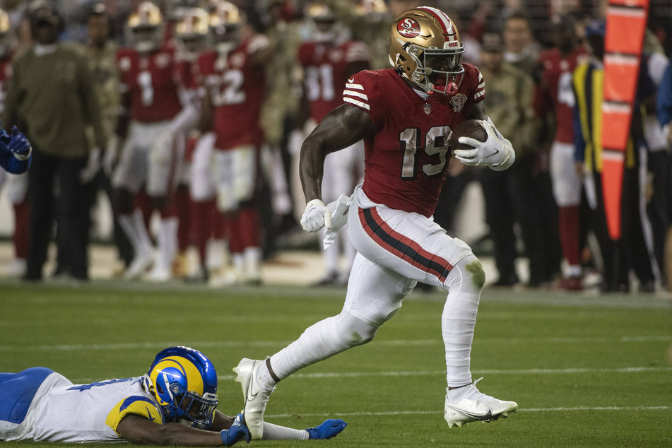 49ers wide receiver Deebo Samuel caught a touchdown and ran for another against the Rams on Monday night.