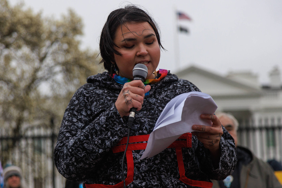Iñupiaq activist Siqiniq Maupin speaks at a protest near the White House in Washington DC demanding that President Biden stop the Willow oil-drilling project.