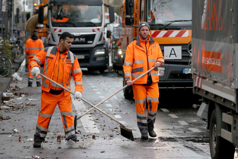 Mitarbeiter der Straßenreinigung in Köln.