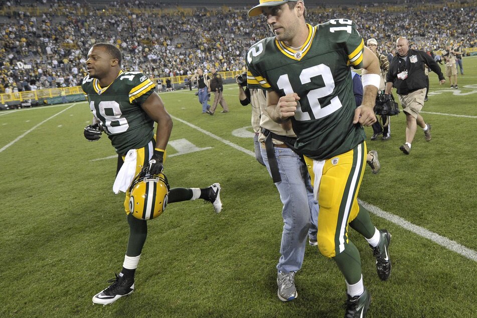 A blast from the past: Randall Cobb (l.) and Aaron Rodgers (r.) run off the field after a win against the New Orleans Saints on September 8, 2011.