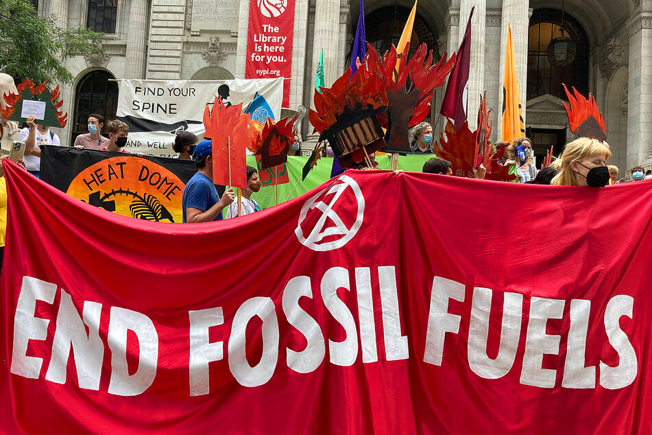 Members of Extinction Rebellion and their supporters gather September 17 in New York to demand action by the government and politicians to prevent catastrophic climate change.