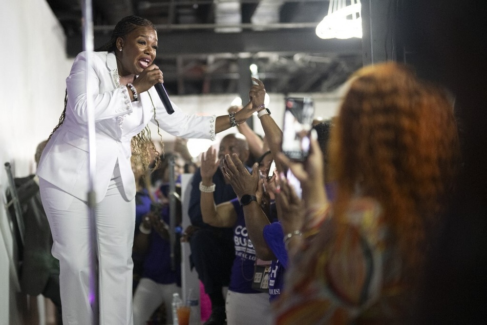 Congresswoman Cori Bush gestures to the crowd during her fiery concession speech.