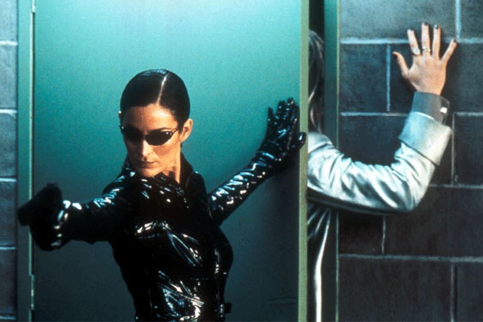 Carrie-Anne Moss (52) begeisterte als Trinity die Zuschauer. Auch sie wird in der Fortsetzung wieder zu sehen sein.