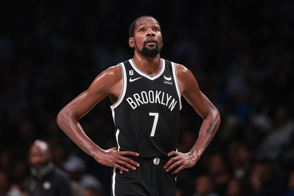 Kevin Durant looks on during the Nets' latest loss in the NBA.
